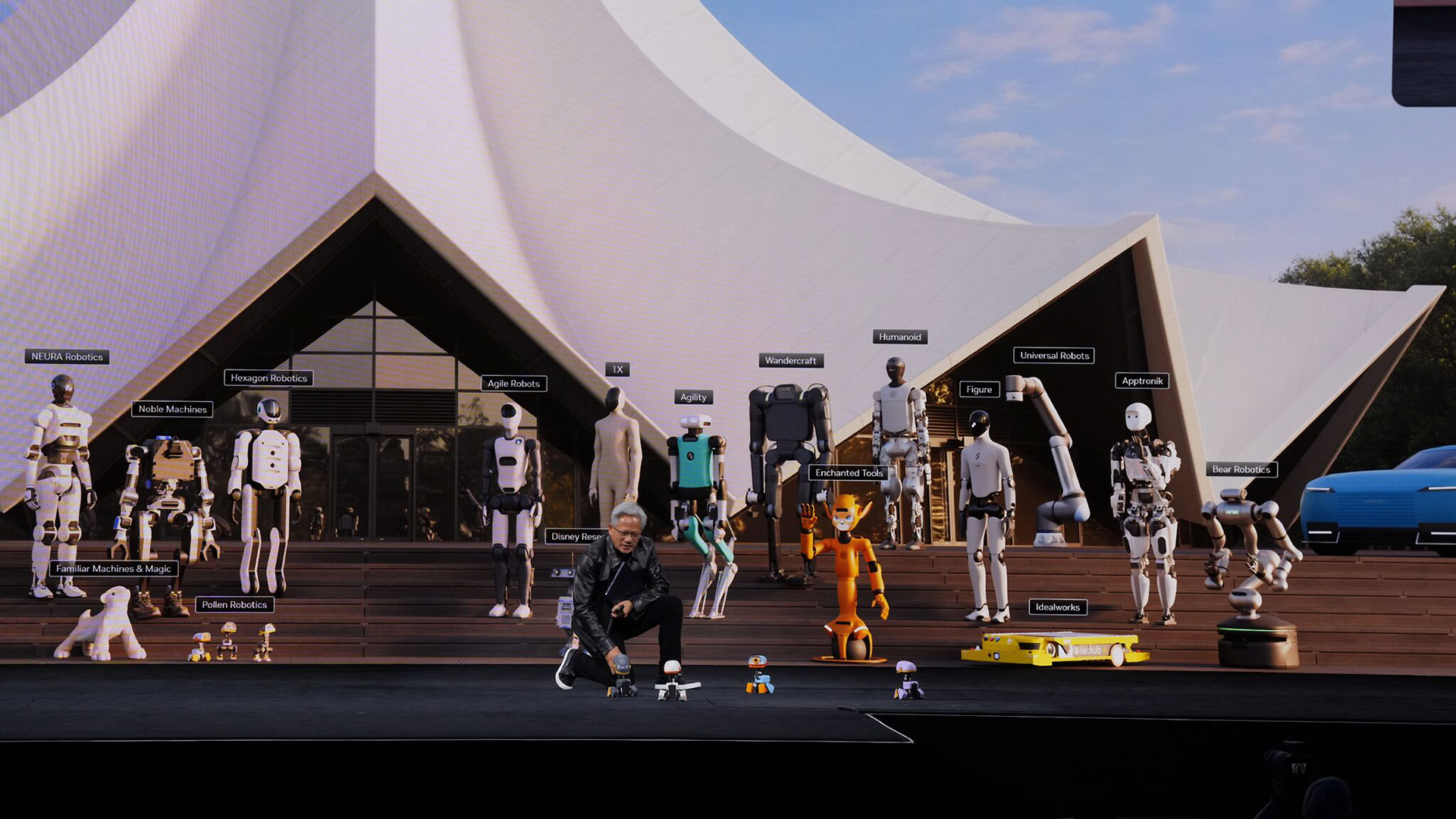 Jensen Huang, GTC Berlin sahnesinde dört Microduck robotunun yanında